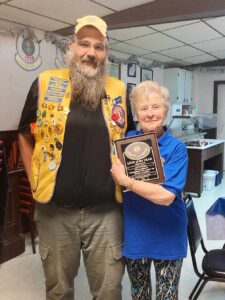 President, Chris Olson, presented the 2023 Lion of the Year Award to Carol Gyllander at the July 5 Iron River Lions Club Meeting.